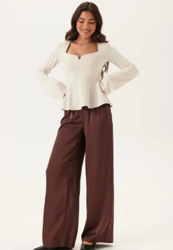 Long Sleeve Peplum Top